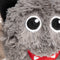 close up of a bat faball®,  gray face, black pointy ears,  black eyes, smile with two front teeth