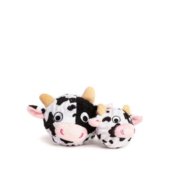 large 4" next to a small 3" black and white cow faball® with a pink nose and beige horns