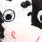 close up of black and white cow faball®
